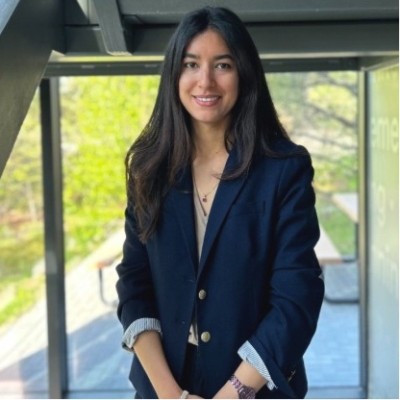 Photo of Soumaya sitting outside